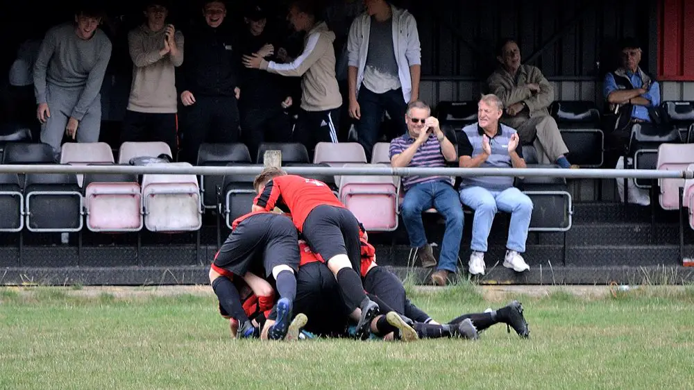 Sandhurst Town celebrate in the FA Cup. Photo: Andy Ormerod.
