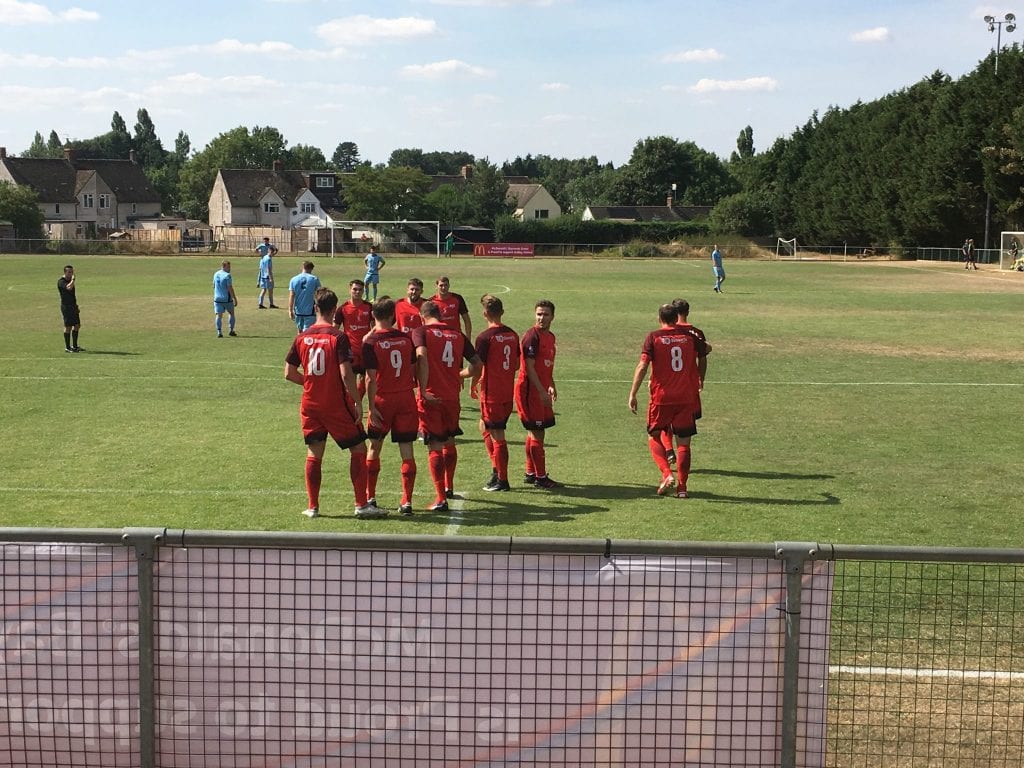 Binfield celebrate scoring at Ardley United.