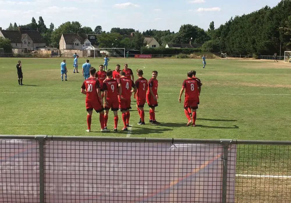 Binfield celebrate scoring at Ardley United.