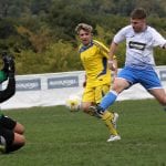 Cameron Miller scoring for Eversley & California FC. Photo: Richard Milam.