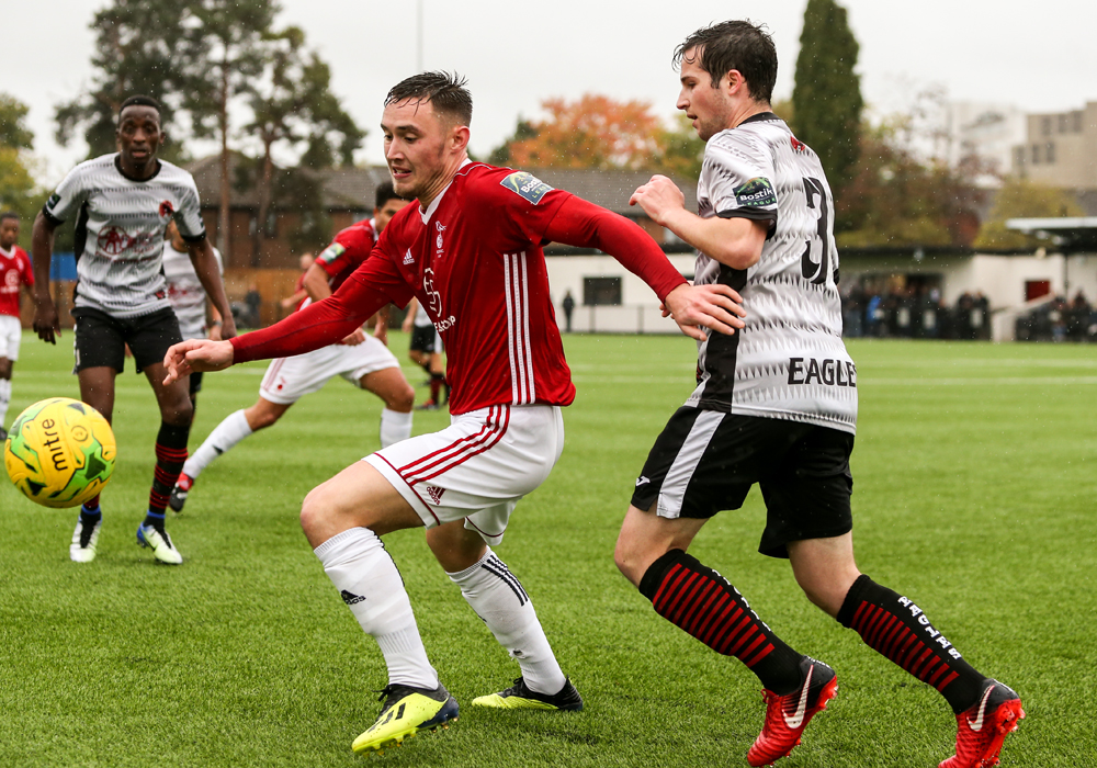 Bracknell Town's Joe Grant takes on Bedfont Sports. Photo: Neil Graham.