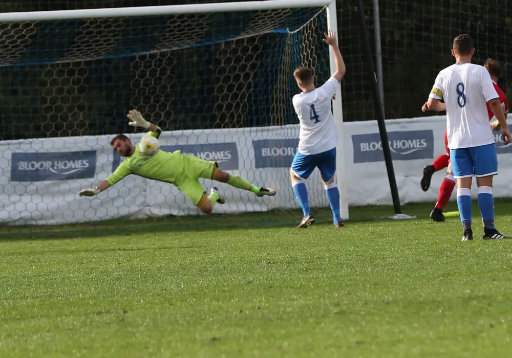 Charlie Lusty makes a great double save. Photo: Richard Milam.