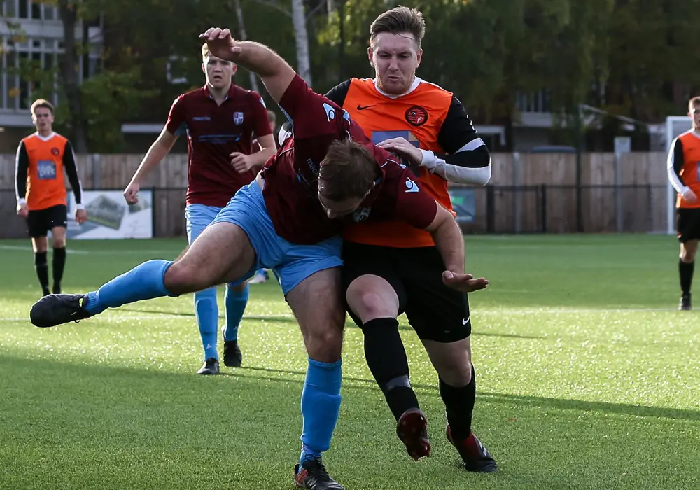 Sam Whiting challenges for the ball. Photo: Neil Graham.