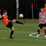 Wokingham & Emmbrook's Josh Harris in action against Wallingford Town. Photo: Graham Tabor.