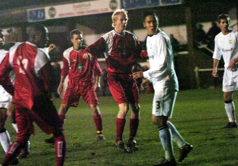 Michael Buck scores for Bracknell Town against MK Dons. Photo: Get Reading.