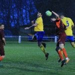 Fabienne Etienne (5) jumps highest to score for Ascot United. Photo: Rob Mack/Shooting Stars