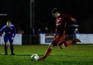 Josh Howell scores a penalty for Binfield FC. Photo: Neil Graham.