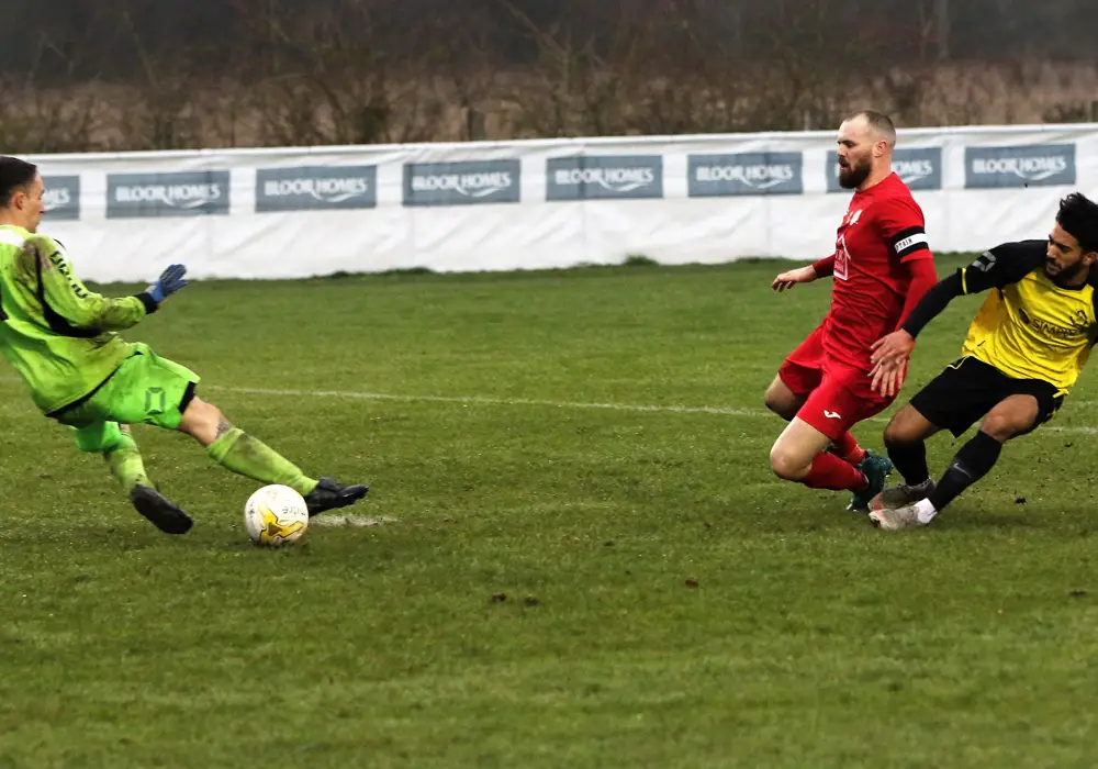 Bradley Brown scores for Eversley. Photo: Richard Milam.