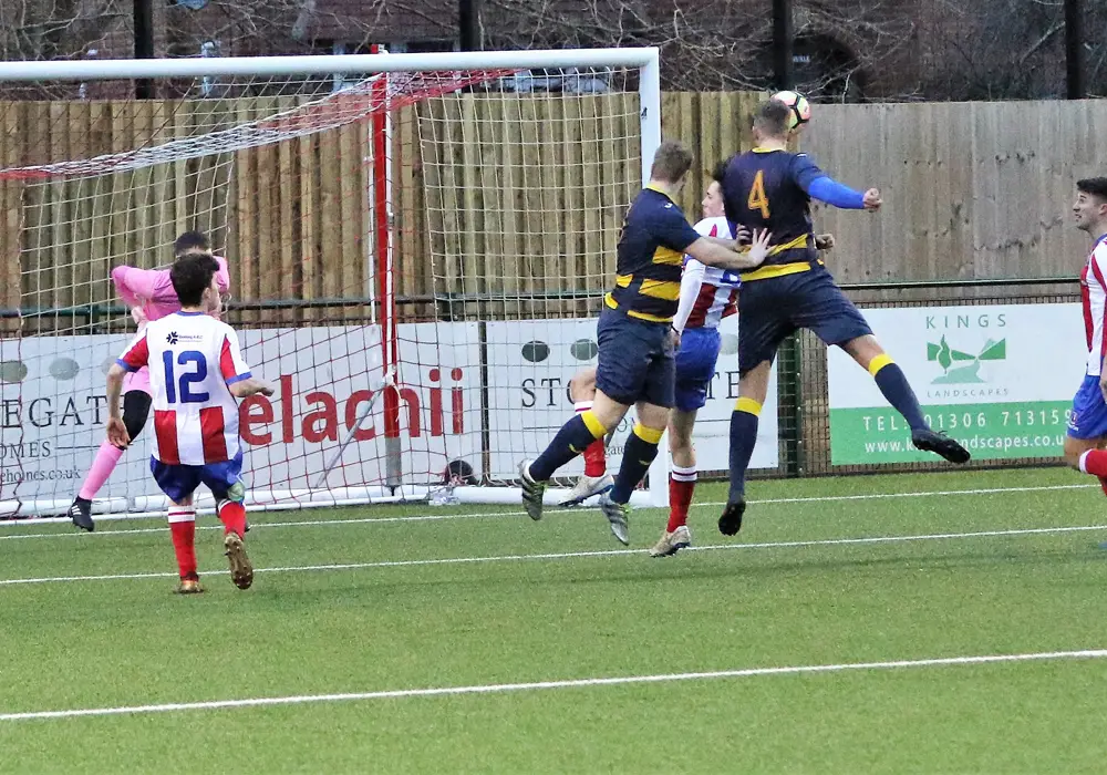Ryan Whyte scoring with a towering header from a free kick. Photo: Richard Milam.