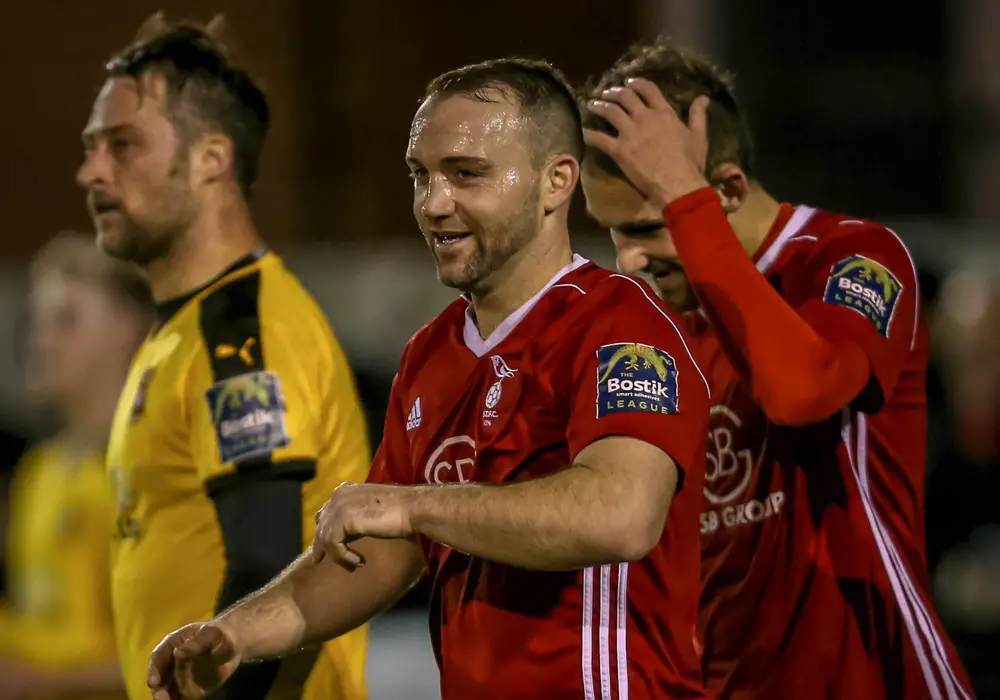 Jamie McClurg all smiles after Bracknell Town beat Folkestone Invicta. Photo: Neil Graham.