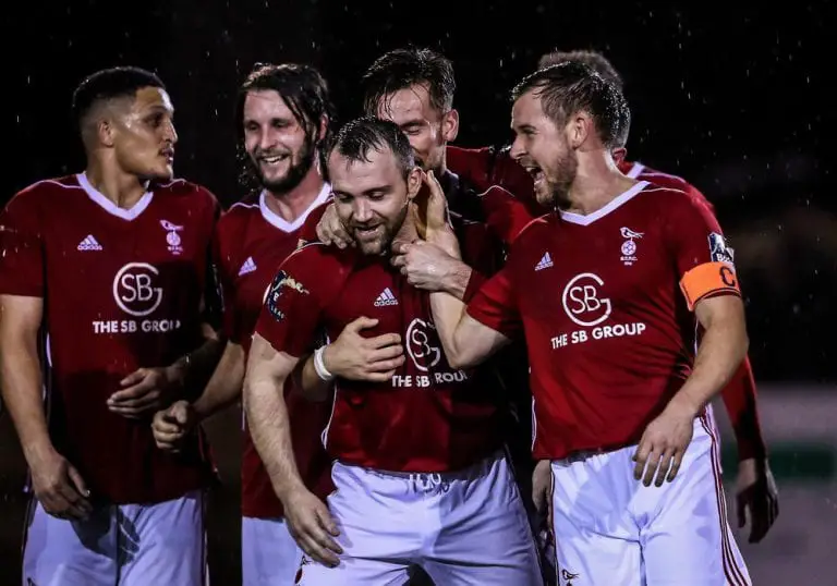 Bracknell Town celebrate with Jamie McClurg. Photo: Neil Graham.