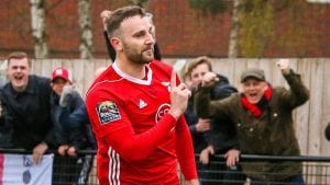Adam Cornell celebrates scoring for Bracknell Town. Photo: Neil Graham.