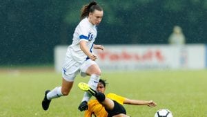 Aimee Claypole evades a tackle for Finland. Photo: Richard Claypole.