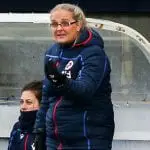 Reading FC Women manager Kelly Chambers directing her players during a football match.
