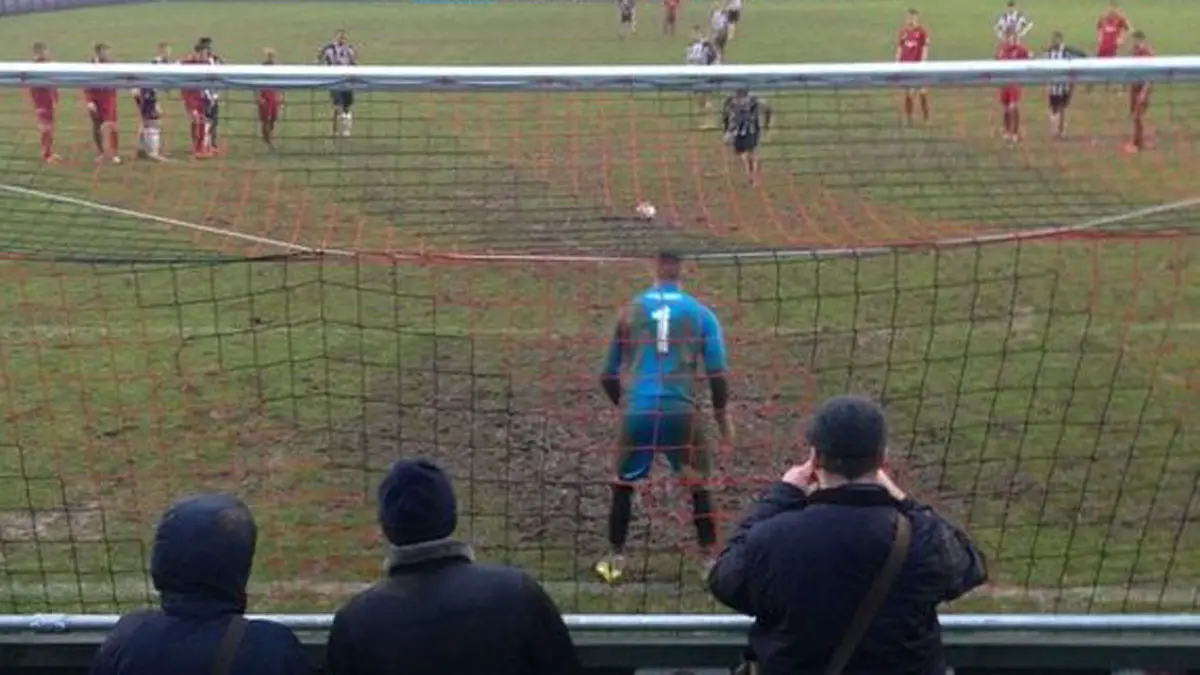 Dave Tarpey steps up for a penalty at Treyew Road. Photo: Neill Maskell.