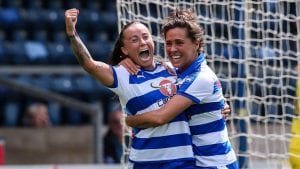 Natasha Harding celebrates with Fara Williams