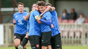 Seb Bowerman celebrates with his Bracknell Town team mates