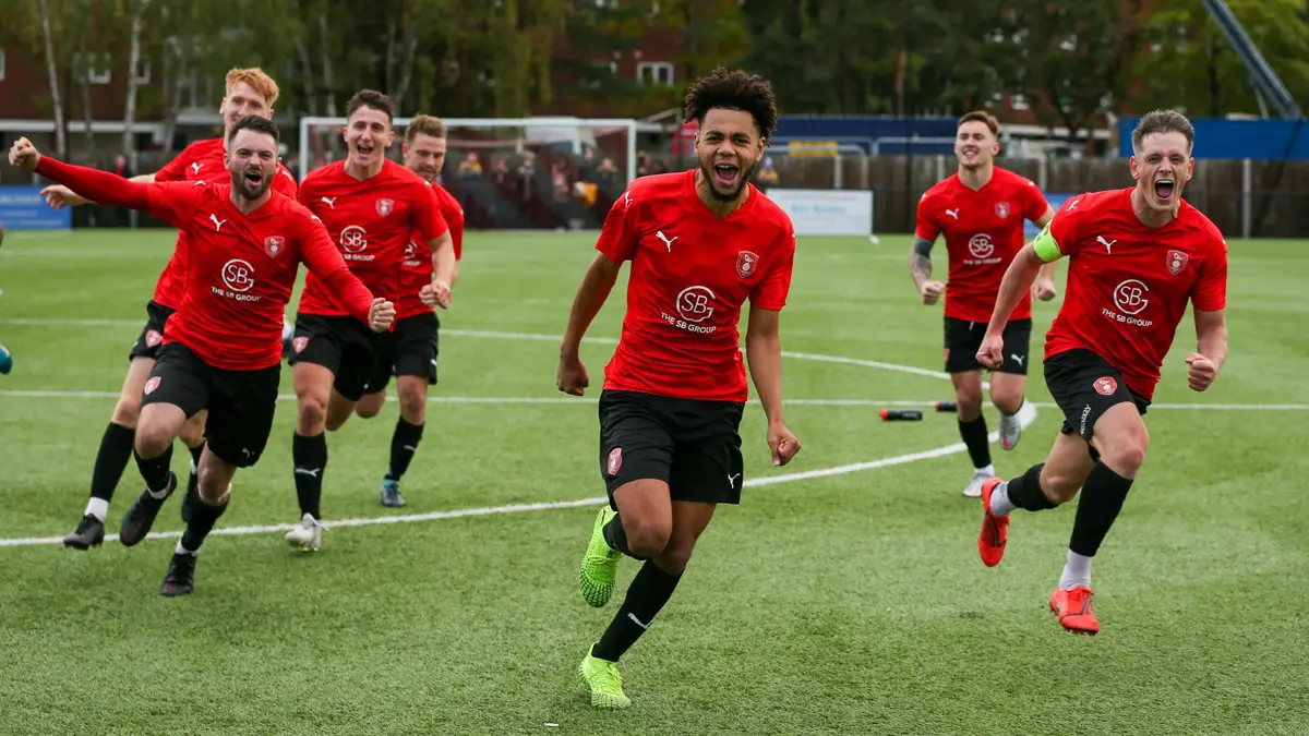 Bracknell Town's players following the FA Cup penalty shootout win. Photo: Neil Graham / ngsportsphotography.com