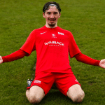 Ollie Harris celebrates his goal for Binfield. Photo: Neil Graham / ngsportsphotography.com