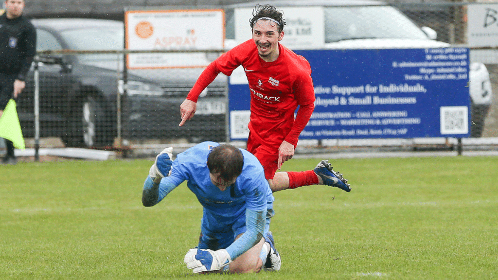 Ollie Harris nets for Binfield in the FA Vase. Photo: Neil Graham / ngsportsphotography.com