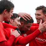 The Binfield players congratulate each other. Photo: Neil Graham / ngsportsphotography.com