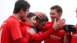 The Binfield players congratulate each other. Photo: Neil Graham / ngsportsphotography.com