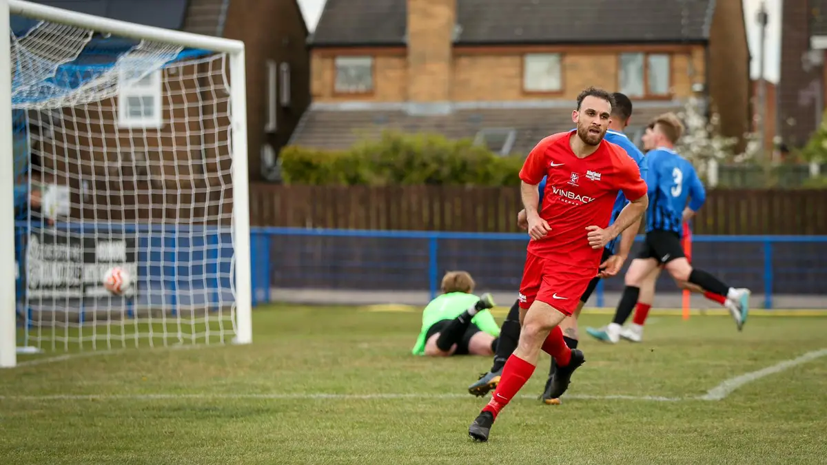 Liam Ferdinand wheels away after scoring for Binfield in the FA Vase.