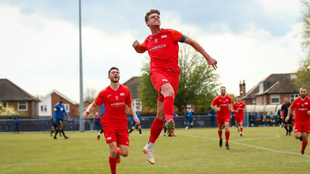 Sean Moore celebrates scoring for Binfield FC. Photo: Neil Graham / ngsportsphotography.com