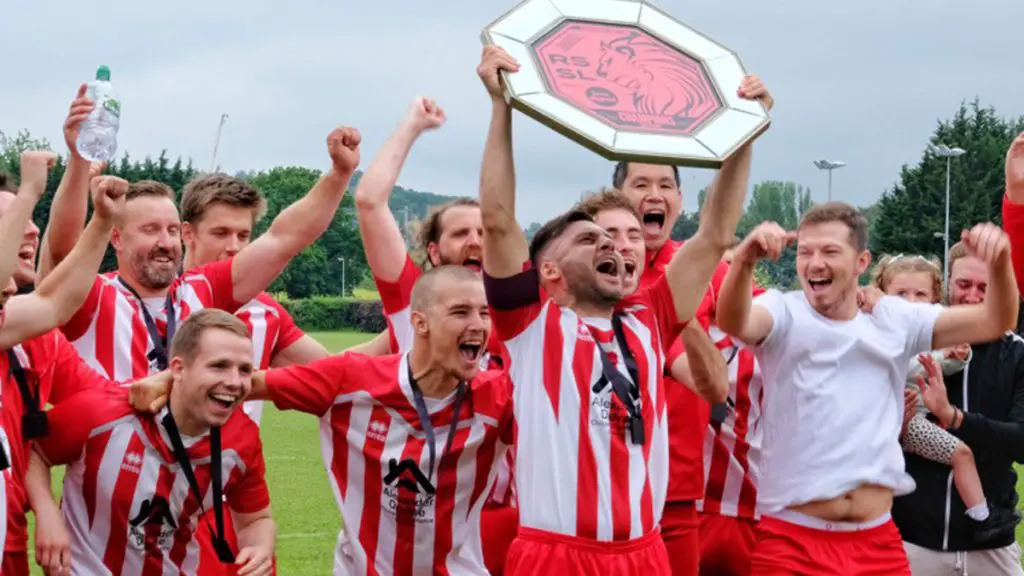 Woodley Saints lift the trophy in the Reading Sunday Social League Photo: Andrew Batt.