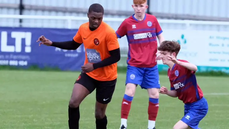 Bradley Ayisi in action for Wokingham & Emmbrook against Aldershot Town in the Allied Counties Cup Semi-Final. Photo: Andrew Batt.