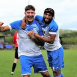 Eversley & California's Reece Buckett celebrates with Paras Gill. Photo: Richard Milam.