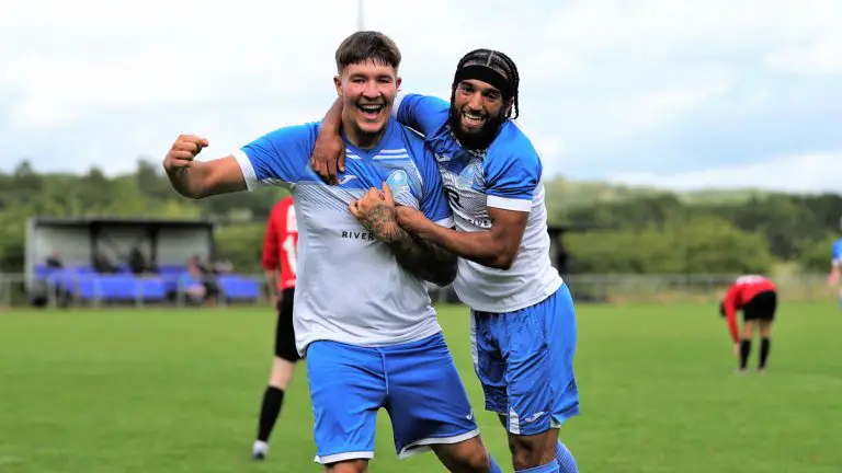 Eversley & California's Reece Buckett celebrates with Paras Gill. Photo: Richard Milam.