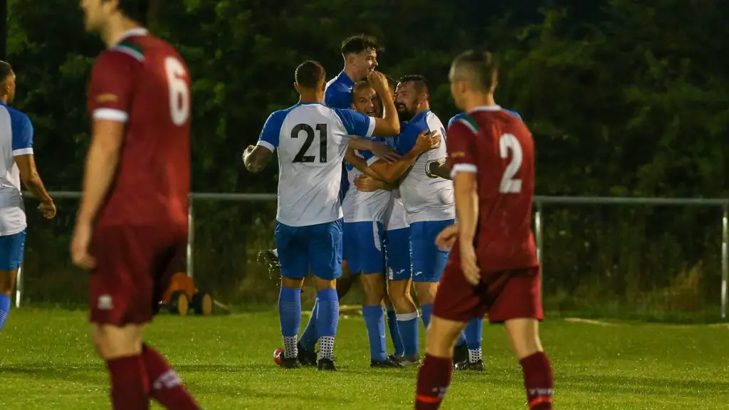 Eversley & California players celebrate an FA Vase goal. Photo: Neil Graham / ngsportsphotography.com