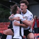 George Smith jumps for joy after scoring Hungerford Town's equaliser. Photo: Jeff Youd.