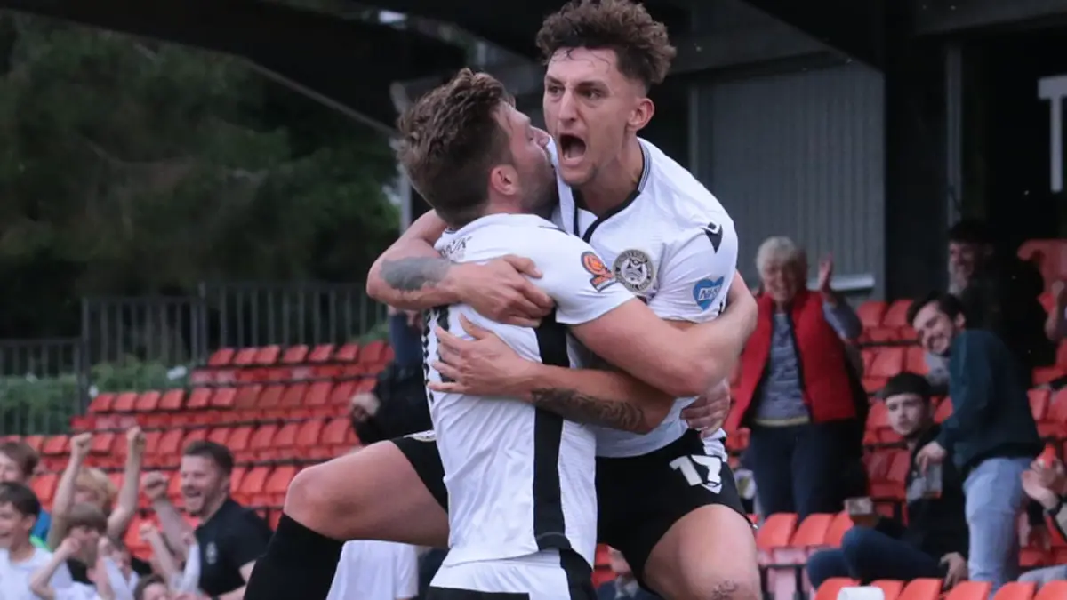 George Smith jumps for joy after scoring Hungerford Town's equaliser. Photo: Jeff Youd.