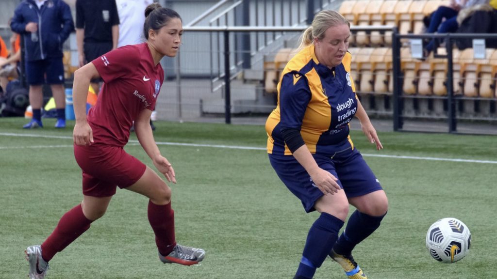 Charisse Tregear chases down Shannon Daly during their Berks & Berks County Cup fixture. Photo: Andrew Batt.