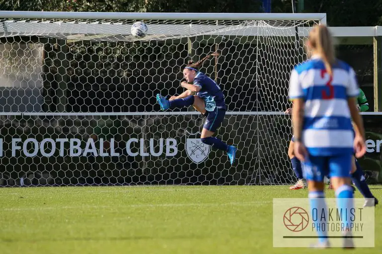 Sophie Wicks makes a clearance for Caversham United in their FA Cup fixture against QPR. Photo: Oakmist Photography