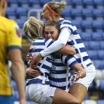 Emma Harries is mobbed by her Reading FC Women teammates. Photo: Neil Graham / ngsportsphotography.com