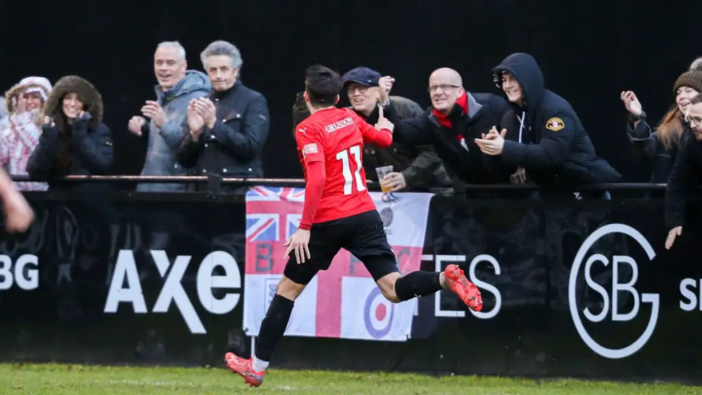 Bracknell Town fans celebrate with Seb Bowerman. Photo: Neil Graham