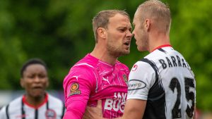 Maidenhead United's Sam Barratt and Notts County's Sam Slocombe argue. Photo: Darren Woolley.