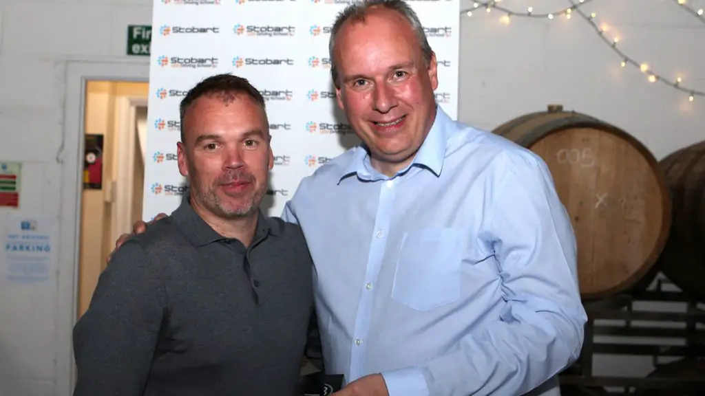 Bobby Wilkinson is presented his award by Steve Witty. Photo: Neil Graham