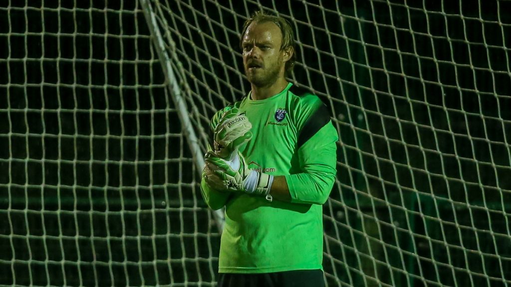 Carl Dennison in goal for Burnham. Photo: Neil Graham.