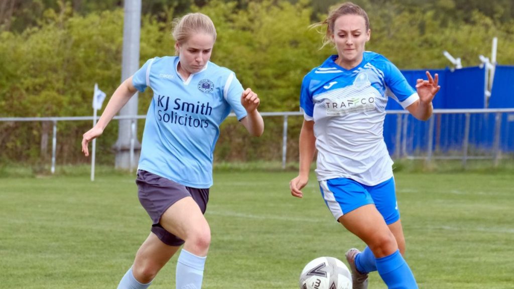 Woodley United battle it out against Eversley and California in the Southern Region Women's Football League Photo: Andrew Batt