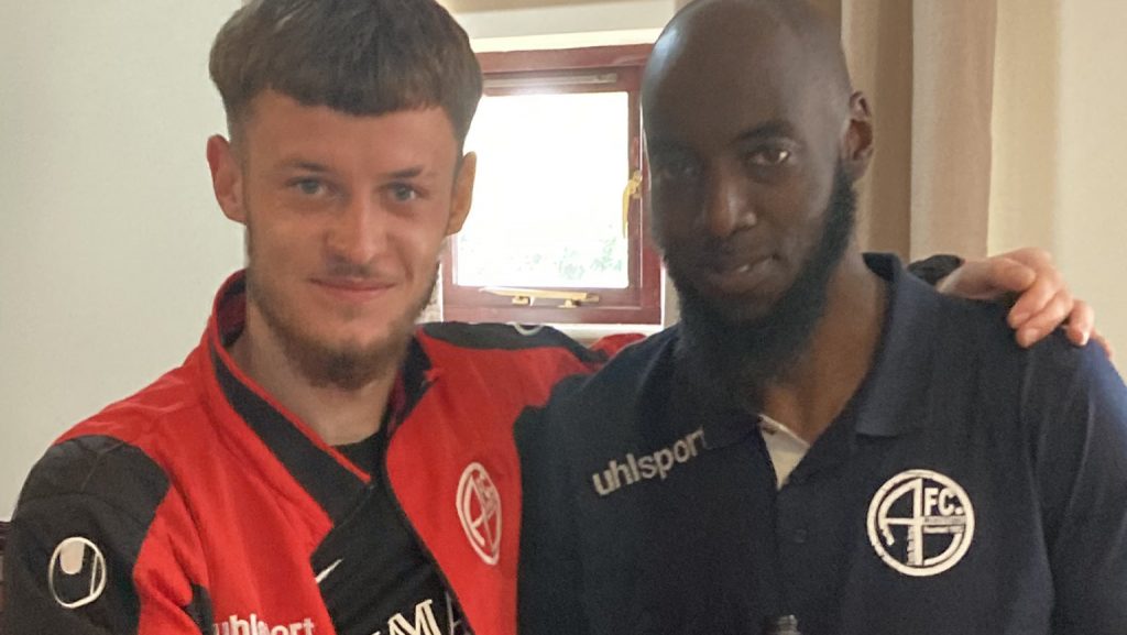 Kacper Malinowski with AFC Aldermaston coach Hamzah Collins.