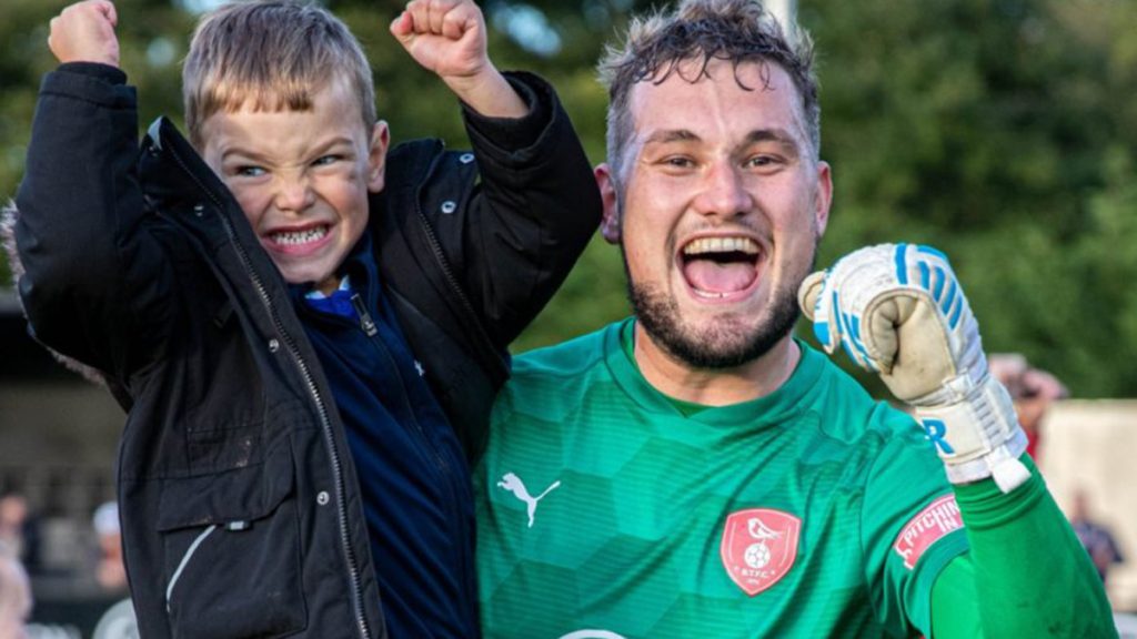 Bracknell Town's Michael Eacott celebrates his sides progress. Photo: John Leakey.