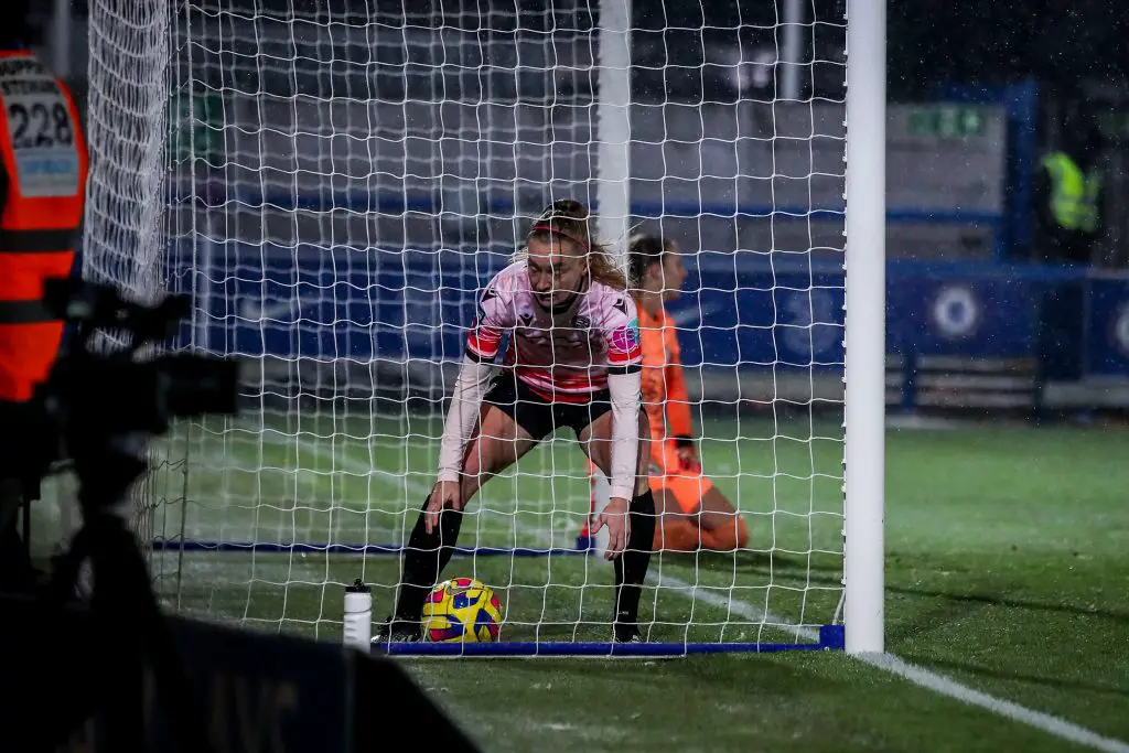 Lauren Wade gathers the ball after a goal for Reading FC Women against Chelsea Women in the FA Womens Super League. Photo: Neil Graham.