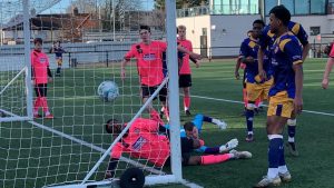 Goal mouth action as Langley beat Brook House. Photo: Scott McNeish.