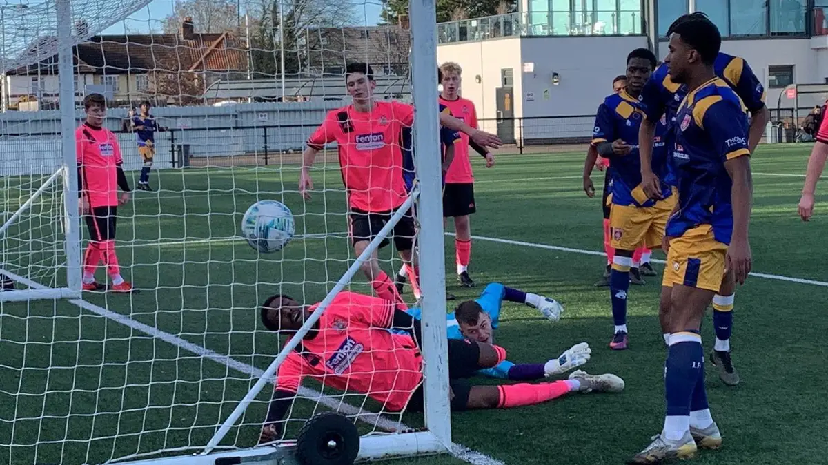 Goal mouth action as Langley beat Brook House. Photo: Scott McNeish.