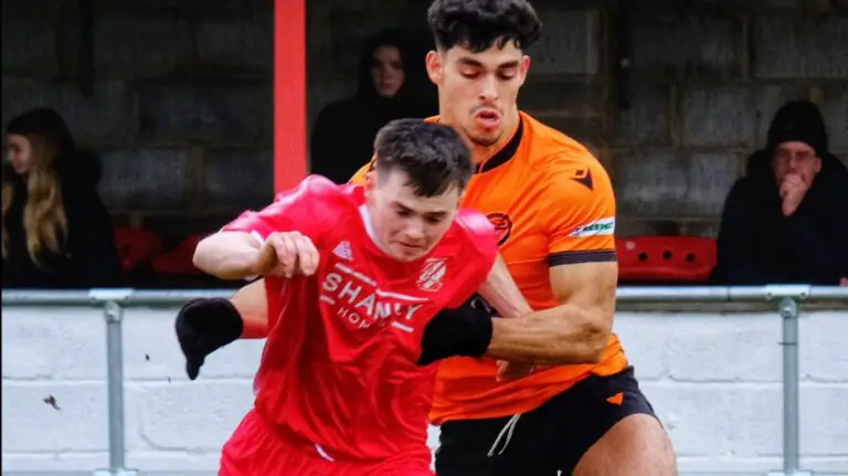 Wokingham & Emmbrook in orange against Flackwell Heath in red.