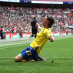 Kai Walters gets the knee slide in, in the FA Vase Final. Photo: Neil Graham.